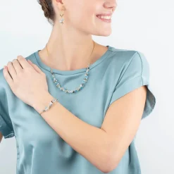 COEUR DE LION Ohrstecker-Tanzende Kristalle Ohrringe Gold Aqua